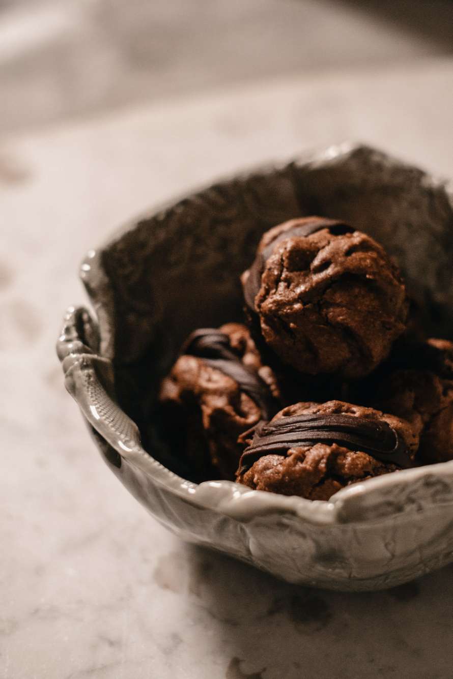 A bowl of chocolate kisses biscuits from Alassio